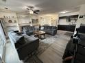 This modern living room showcases neutral tones, built-in shelving, and an inviting ambiance at 5941 Deerwood Ct, Indianapolis, IN 46254