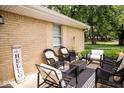 Outdoor patio featuring cozy seating arrangement and stylish decor at 6180 Winnpeny Ln, Indianapolis, IN 46220