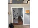 Open foyer view of staircase, wood floors, and neutral paint at 8926 Durban Ct, Indianapolis, IN 46234
