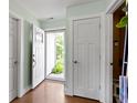 Welcoming entryway with hardwood floors and natural light at 10262 Carmine Dr, Noblesville, IN 46060