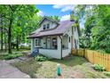 Attractive exterior of a two-story home with a covered front porch and well-maintained landscaping at 1511 E Edwards Ave, Indianapolis, IN 46227