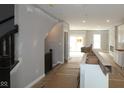 Open living space with stairway and view of the living room with a fireplace at 4171 Barrel Ln, Westfield, IN 46062