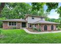 A charming two-story home, displaying a well-manicured lawn and welcoming front entrance at 4570 Moccosin Pl, Greenwood, IN 46142