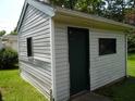 Shed with siding, door, and window at 509 Eberhart Dr, Shelbyville, IN 46176