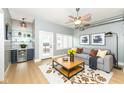 Inviting living room with modern decor, stylish furnishings, and ample natural light at 721 E North St # 2C, Indianapolis, IN 46202