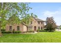 Two story brick home on a large lot with mature trees at 725 Ridge Gate Dr, Brownsburg, IN 46112