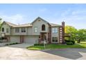 Charming townhome with attached two-car garage and well-manicured lawn at 8955 Stonegate Rd # A, Indianapolis, IN 46227
