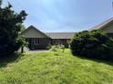Expansive backyard with lush green lawn and a patio area, perfect for outdoor enjoyment at 10712 Downing St, Carmel, IN 46033