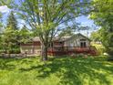 A spacious backyard featuring a wooden deck, perfect for outdoor entertaining at 11603 Maze Rd, Indianapolis, IN 46259