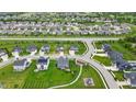 Expansive aerial view of the neighborhood showcasing the community layout and green spaces at 11809 Redpoll Trl, Noblesville, IN 46060