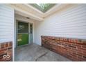 Charming home entry with brick wall and decorative door at 640 Shady Creek Ct, Greenwood, IN 46142
