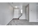 Open living area features new carpeting, fresh paint, and a staircase leading to the upper level at 8030 Cork Bend Ln, Indianapolis, IN 46239