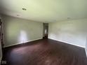 Spacious living area boasts hardwood floors and recessed lighting, offering a modern touch at 9045 Stardust Dr, Indianapolis, IN 46229