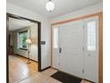 Inviting foyer featuring neutral paint and flooring leading into the home at 9101 Ditch Rd, Indianapolis, IN 46260