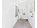 Cozy entryway with coat hooks, natural light, and neutral paint at 1910 W 10Th St, Anderson, IN 46016