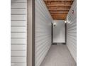 Neutral hallway area with two doors, overhead lighting, and carpet flooring at 8176 Shorewalk Dr # C, Indianapolis, IN 46236