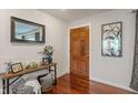 Inviting entryway with wood floors, console table, and natural light at 4350 Sylvan Rd, Indianapolis, IN 46228