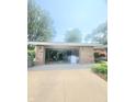 Attached two-car garage providing ample parking and storage at 623 Chariot Ln, Indianapolis, IN 46227