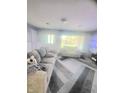 Comfortable living room with large windows and neutral decor at 623 Chariot Ln, Indianapolis, IN 46227