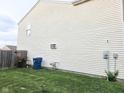 Well maintained backyard with ample lawn space and partial fencing at 7906 States Bend Ln, Indianapolis, IN 46239