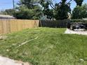 Spacious backyard with wooden fence, perfect for outdoor activities at 1163 Groff Ave, Indianapolis, IN 46222