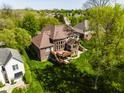 Spacious backyard with a wooden deck, ideal for outdoor entertaining at 16307 Stony Ridge Dr, Noblesville, IN 46060