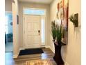 Inviting foyer featuring hardwood floors, modern decor and lots of natural light at 17324 Americana Crossing Xing, Noblesville, IN 46060
