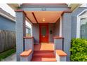 Inviting front porch with brick pillars, offering a welcoming entrance to the home at 525 Orange St, Indianapolis, IN 46203