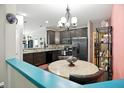 Bright kitchen with modern appliances, ample counter space, and a cozy breakfast nook at 6315 Emerald Field Way, Indianapolis, IN 46221