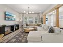 Bright and open living room featuring a large sectional sofa and modern decor at 1623 Hoyt Ave, Indianapolis, IN 46203