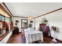 Traditional dining room with wood floors, trim, and ample natural light at 4770 Willow Rd, Zionsville, IN 46077