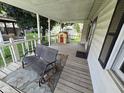 Spacious front porch with a bench, offering a welcoming entrance at 627 Plum St, Noblesville, IN 46060