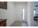 Inviting entryway with neutral tones and a view leading into a bedroom at 6608 W Shoreline Ct, Greenfield, IN 46140