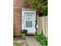 Close-up of the front door with house number and lush greenery at 7392 S Meridian St, Indianapolis, IN 46217