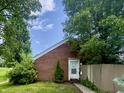 Charming brick home with a well-maintained front yard and inviting entrance at 7392 S Meridian St, Indianapolis, IN 46217