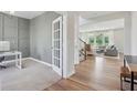 Stylish office space with french doors, connecting to the open-concept living area at 9671 Ridgecrest Ln, McCordsville, IN 46055