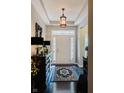 Welcoming foyer with elegant lighting, stylish decor, and a beautiful entryway at 18973 Elder Ridge Dr, Noblesville, IN 46062