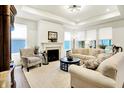 Bright and airy living room with fireplace, plush seating, and ample natural light at 2612 Ruffian Dr, Westfield, IN 46074