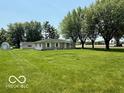 Desirable home featuring a spacious front yard and detached garage at 535 S 450 E, Franklin, IN 46131