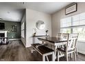 Bright dining room featuring stylish table setting, a window with natural light and modern decor at 628 Tess Blvd, Westfield, IN 46074