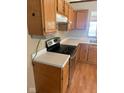 Updated kitchen featuring wood cabinets, white countertops, and stainless steel appliances at 39 Meadow Creek East Blvd, Whiteland, IN 46184