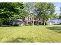 Spacious two-story home nestled on a large lot with a well-maintained lawn at 54 Horseshoe Ln, Carmel, IN 46033