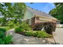 Exterior view of home highlighting the brick and siding details at 6118 Deerwood Dr, Greenwood, IN 46143
