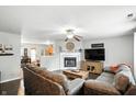 Inviting living room with fireplace and open concept layout at 19433 Tradewinds Dr, Noblesville, IN 46062