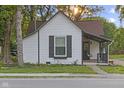 Charming two-story home with a front porch and well-maintained lawn at 330 S Green St, Brownsburg, IN 46112
