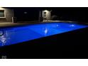 Stunning pool at night with beautiful lighting, enhancing the ambiance and creating a serene environment at 4931 Kerrington Blvd, Bargersville, IN 46106