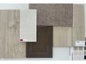 Design selections featuring flooring, carpet, backsplash, cabinet, and countertop samples at 15946 Meadow Frost Ct, Fishers, IN 46037