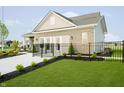 This home features a fenced yard and well-manicured lawn creating a beautiful outdoor space at 278 Evening Bay Ct, Pendleton, IN 46064