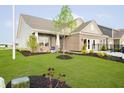 Beautiful home showcasing a well-maintained lawn and inviting architecture, perfect for curb appeal at 278 Evening Bay Ct, Pendleton, IN 46064