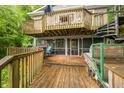 Multi-level wooden deck with a spiral staircase and screened in porch, perfect for outdoor entertaining at 460 W Hinshaw Dr, Nineveh, IN 46164